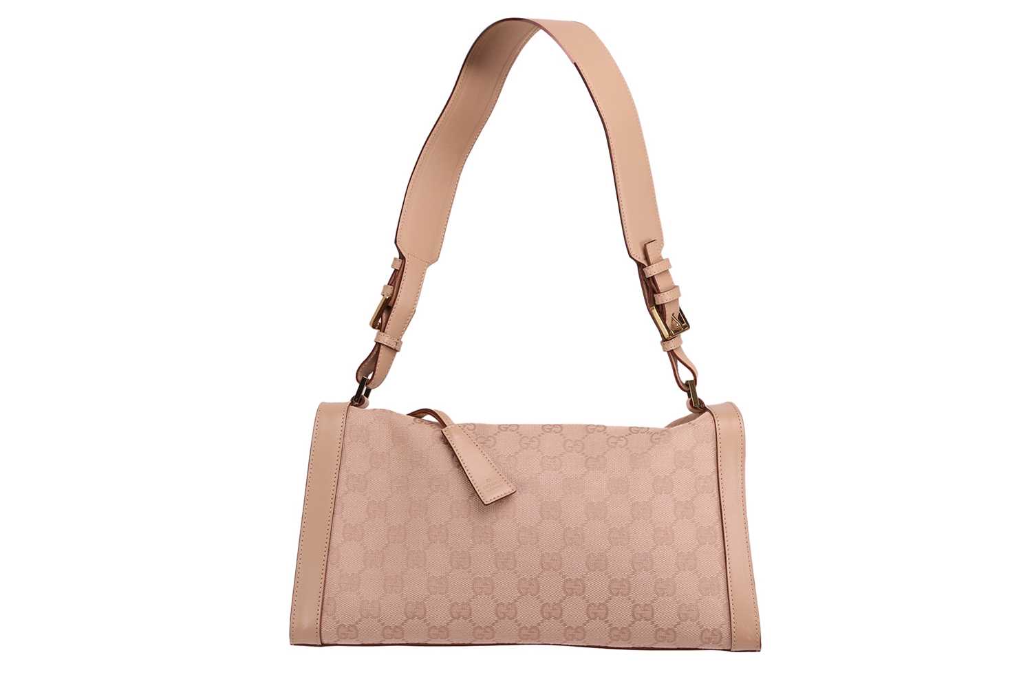 Lot 135 - Gucci - a shoulder bag in beige canvas with...