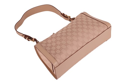 Lot 135 - Gucci - a shoulder bag in beige canvas with...