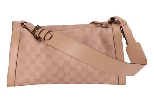 Lot 135 - Gucci - a shoulder bag in beige canvas with...