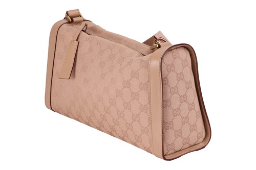 Lot 135 - Gucci - a shoulder bag in beige canvas with...