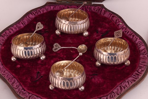 Lot 99 - A cased set of four Victorian silver salts,...