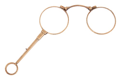 Lot 249 - A pair of lorgnettes with spring mechanism, in...