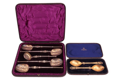 Lot 108 - A cased set of silver gilt spoons and sugar...