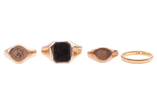 Lot 37 - Four rings; comprising a 22ct yellow gold...