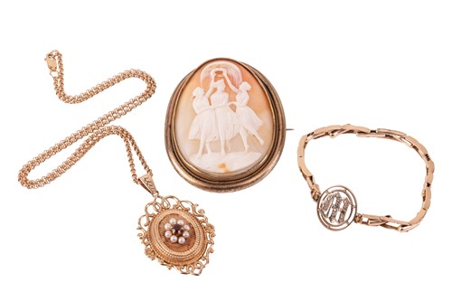 Lot 73 - A locket pendant on chain, a bracelet and a...