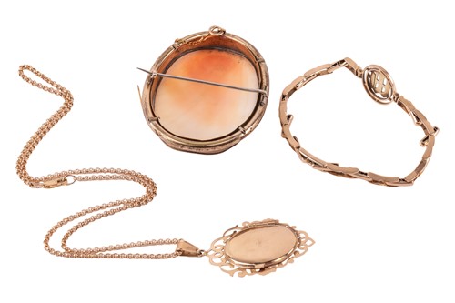 Lot 73 - A locket pendant on chain, a bracelet and a...