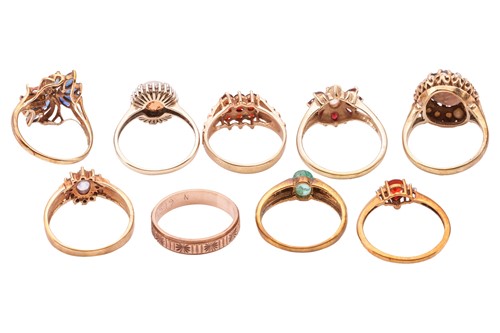 Lot 72 - A collection of nine gem-set rings in 9ct gold;...