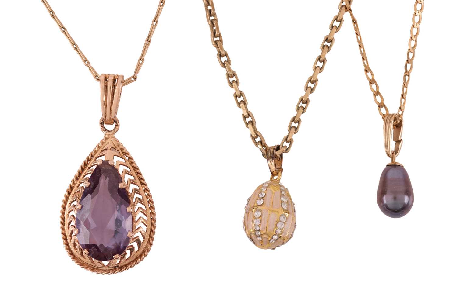Lot 67 - Three pendant on chains; including a synthetic...