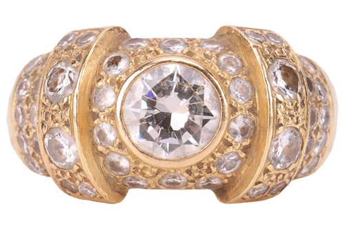 Lot 86 - A diamond-set cluster ring of bombe design,...