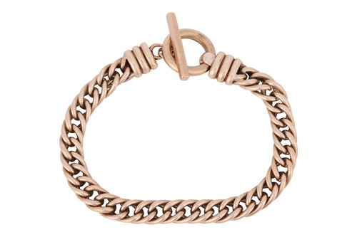 Lot 183 - A double-curb link bracelet, in yellow metal...