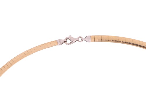 Lot 82 - Two snake chains; a bi-colour metal snake...