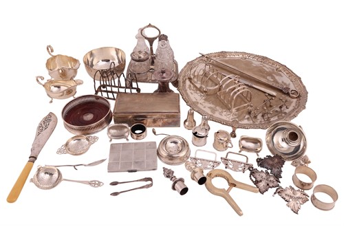 Lot 88 - A George III four-bottle cruet stand and...
