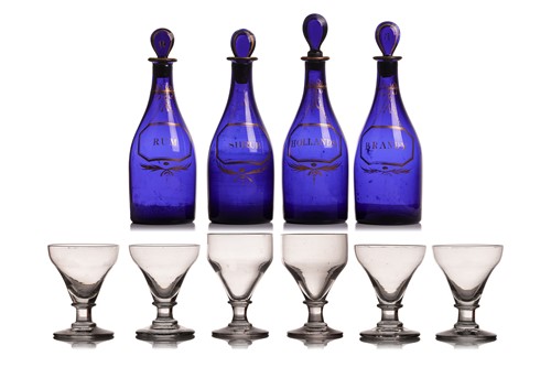 Lot 228 - A set of four 19th-century Bristol blue glass...