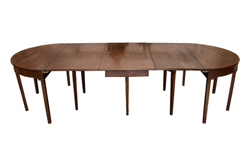 Lot 128 - A George III mahogany extending "D" end dining...