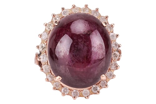 Lot 34 - A star sapphire and diamond dress ring,...