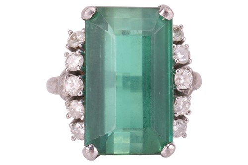 Lot 155 - A tourmaline and diamond-set dress ring, the...