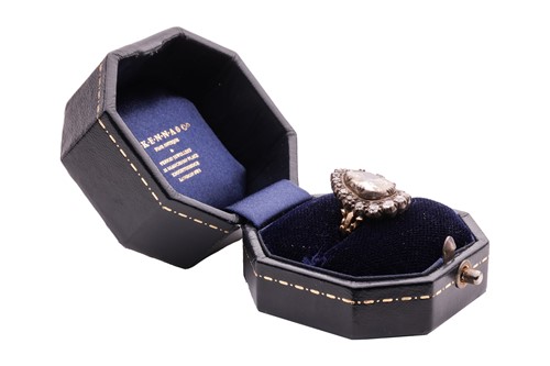 Lot 96 - An old-cut diamond cluster ring, centred with...