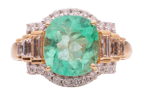Lot 18 - An emerald and diamond-set dress ring, the...