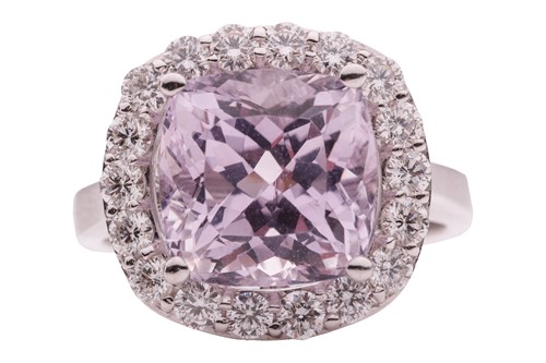 Lot 50 - A kunzite and diamond halo ring in 18ct white...