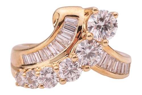 Lot 146 - A diamond-set crossover ring; featuring a...