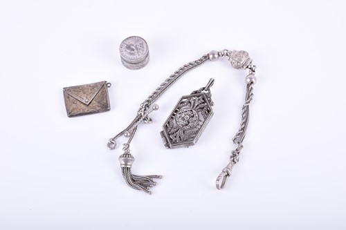 Lot 630 - A small group of white metal and silver items...