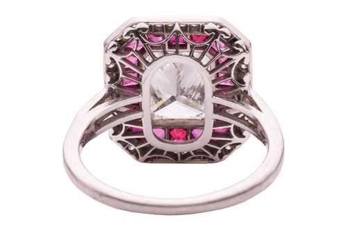 Lot 232 - An Art Deco diamond and ruby cluster ring,...