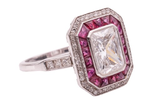 Lot 232 - An Art Deco diamond and ruby cluster ring,...