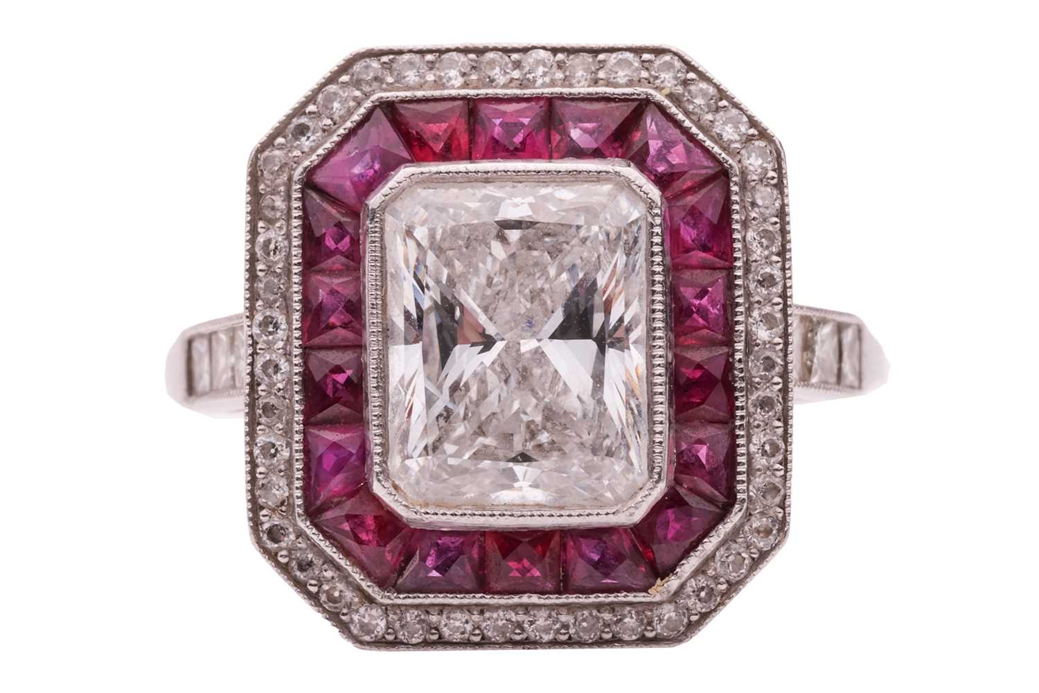 Lot 232 - An Art Deco diamond and ruby cluster ring,...