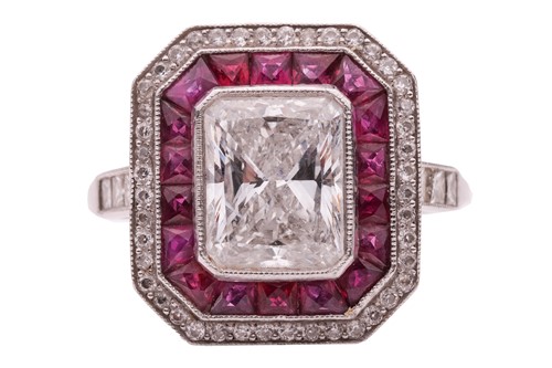 Lot 232 - An Art Deco diamond and ruby cluster ring,...