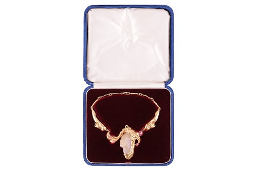 Lot 236 - A carved opal and ruby necklace in 18ct gold,...