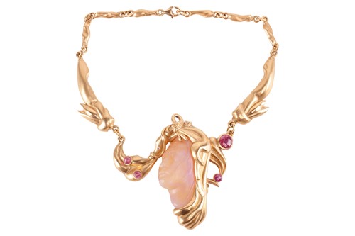 Lot 236 - A carved opal and ruby necklace in 18ct gold,...
