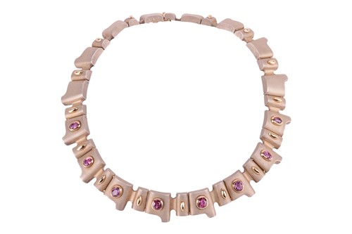Lot 129 - A geometric collar necklace set with pink...