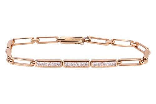Lot 220 - Tiffany - a diamond-set bracelet; comprising...