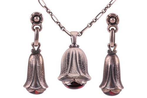 Lot 222 - Georg Jensen - Garnet floral pendant and...