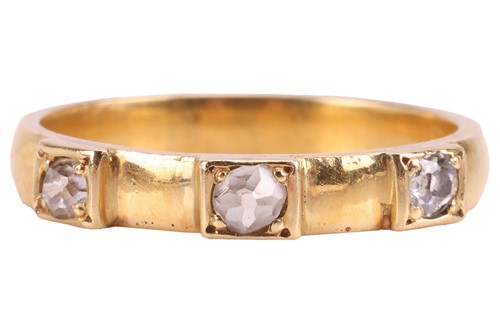 Lot 68 - An old-cut diamond three-stone ring, with an...