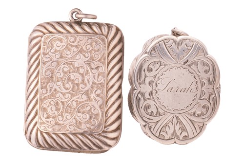 Lot 325 - Two Victorian silver vinaigrettes; the oval...
