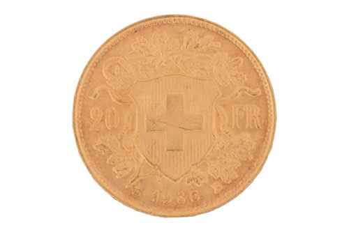 Lot 22 - A Switzerland 1935 gold 20 Francs coin with...