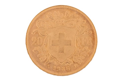 Lot 23 - A Switzerland 1935 gold 20 Francs coin with...