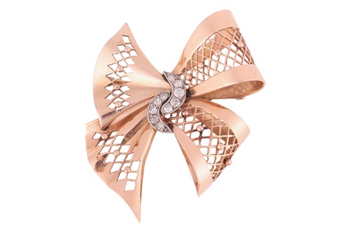 Lot 34 - A diamond-set bow brooch, of fretwork design,...