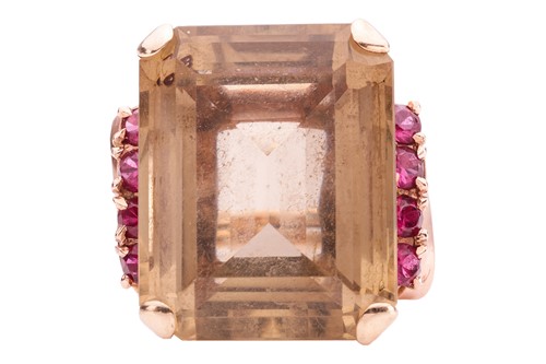 Lot 33 - A smoky quartz and pink sapphire dress ring,...
