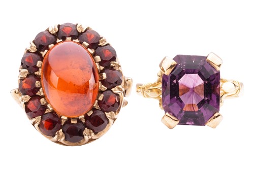 Lot 42 - Two paste dress rings; to include a red paste...