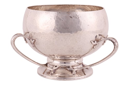 Lot 358 - An Arts and Crafts silver bowl by Wakely &...