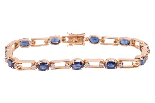 Lot 73 - A sapphire and diamond line bracelet,...