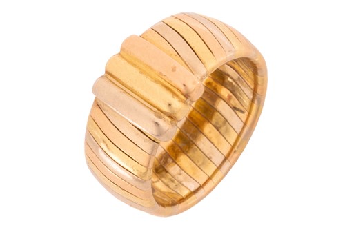 Lot 60 - Cartier - Tri-coloured Tubogas band ring, with...