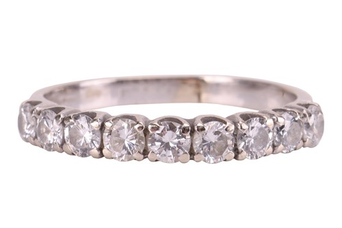 Lot 29 - A diamond half-eternity ring, with an...
