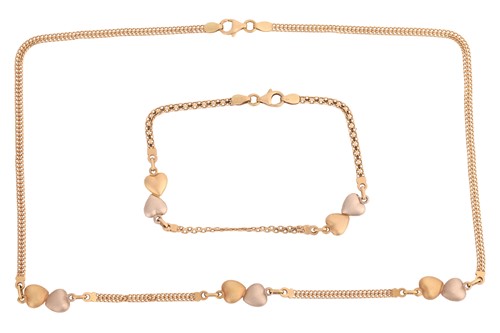 Lot 97 - A double-heart necklace and matching bracelet,...