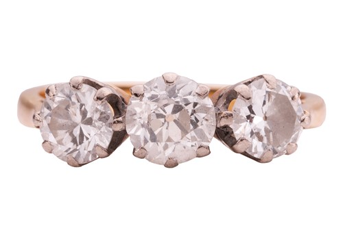 Lot 113 - A diamond trilogy ring, set with a central Old...