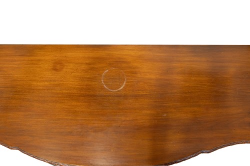 Lot 95 - A mahogany large serpentine sideboard of...