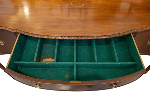 Lot 95 - A mahogany large serpentine sideboard of...