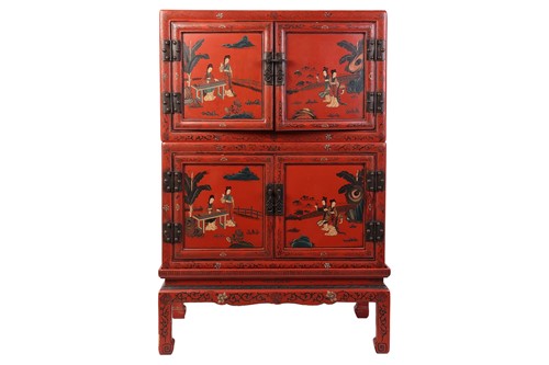 Lot 85 - A Chinese red lacquer two-section cabinet on...